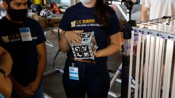 Kylie presenting CubeSat during TRR