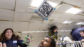 Abhay with CubeSat floating - Flight Campaign 3