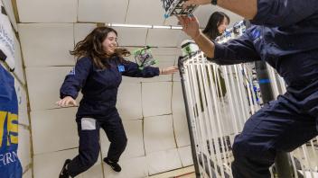 Abhay and Kylie operating HDD CubeSat experiments 