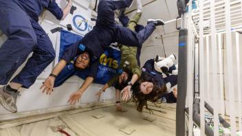 HDD Flight Campaign 3 team floating in microgravity