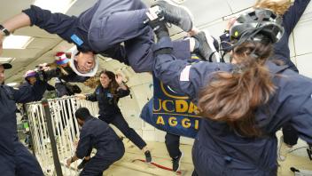 HRVIP members floating in Zero-G