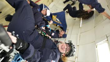 HRVIP members floating in Zero-G