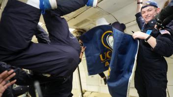 Preston Vanderpan and Chris Andrade floating in Zero-G
