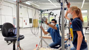 Chris, Natasha, Dzuy during Zero-G training