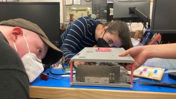 Cordell and Kylie during CubeSat fit-check at JSC