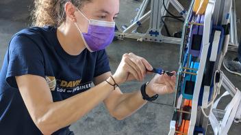 Janine tightening screws 