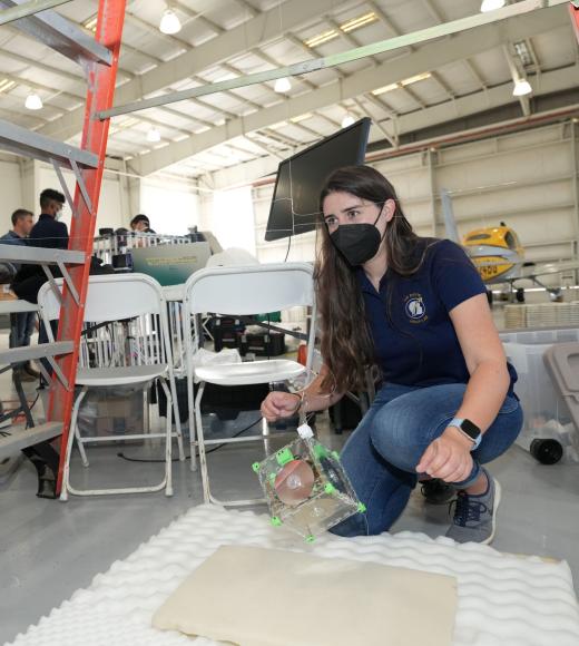 Kylie Cooper with Fishing Line Test in Zero-G Hangar