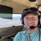 Kelden flying a plane